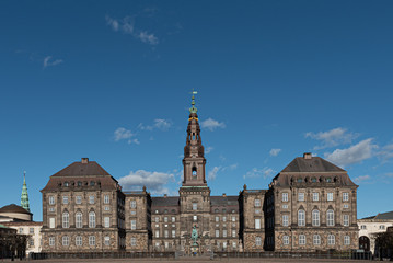 Christiansborg Palace under a blue sky on a sunny day