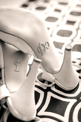 Wedding high-heeled sandals with I do on the sole of the shoe