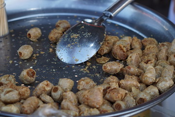 Deep Fried Crab Meat Rolls (Hoi Jo) fried in silver plate