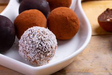 Homemade raw healthy vegan energy balls truffles with muesli.