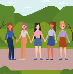 Obraz premium Women holding hands at park vector design