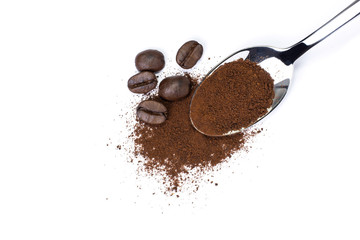 Ground coffee and coffee bean isolated on white background. Top view