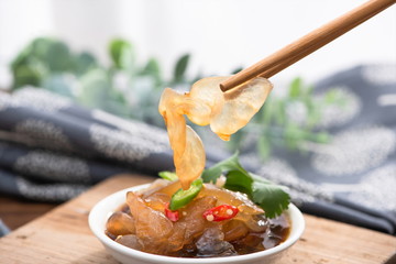 Pickled with jellyfish head, the pickle tastes hot and sour. It tastes crispy. It's a seafood delicacy in Asia and the East. It's very popular in Korea and Japan. © InkheartX