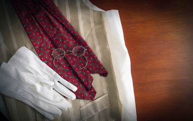 Gentleman's waistcoat, cravat, glasses and gloves
