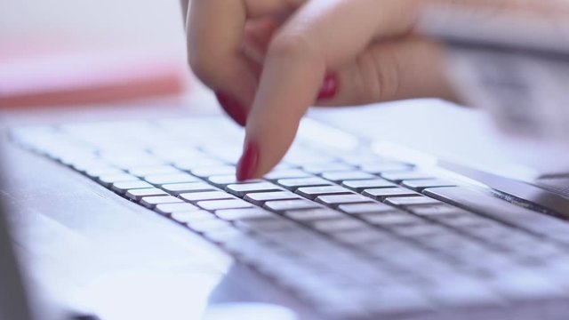 businesswoman hands type on laptop keyboard business 4K Hands touch typing pointing cloud data social network media, Businesswoman working on tablet computer,Extreme close-up human hands on keyboard