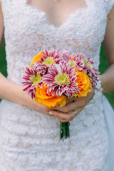 bouquet in hands of bride