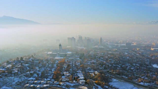 Slow Aerial Wraparound Downtown Salt Lake City Utah on early winter morning