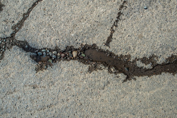 Texture of the asphalt crack.