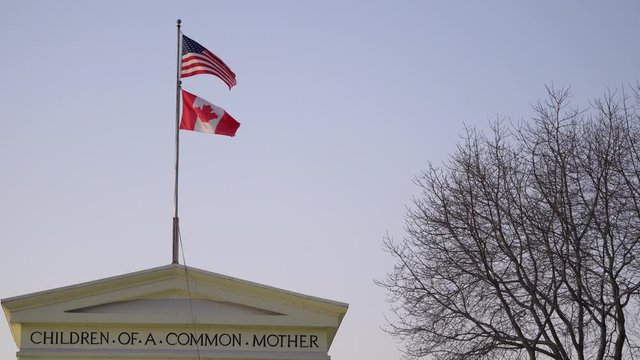 4K seamless United States of America USA and Canada National flag slow waving with visible wrinkles.