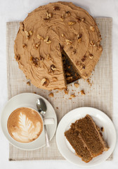 fresh coffee cake sliced served with a coffee