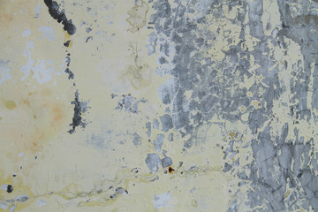 weathered wall with mold and cracked paint