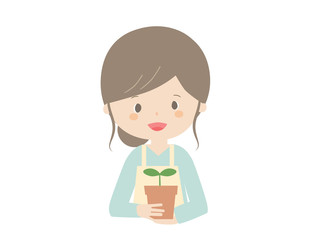 Young woman with seedling