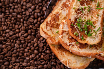 close-up. part croutons background coffee beans. 