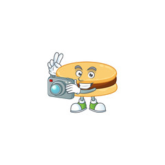Brown alfajor mascot design as a professional photographer with a camera