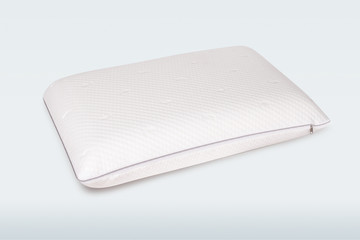 Orthopedic Pillow with a Memory Effect. Medical treatment pillow for sleep. Comfort Memory Pillow under the head with a recess under the shoulder isolated on white background. Sleeping Support Pillow