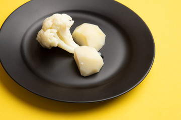 cooked cauliflower dish with potatoes