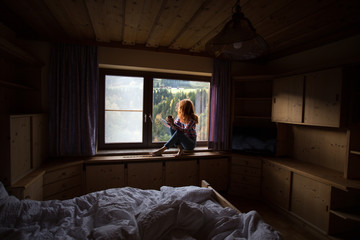 Fototapeta premium girl on a windowsill
