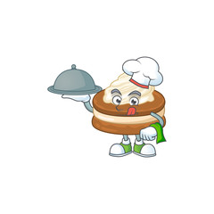 chef cartoon character of white cream alfajor with food on tray