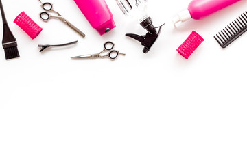 Beauty saloon accessories - combs, sciccors for hairdressing - on white background top-down frame copy space