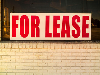 Fototapeta na wymiar For Lease Red Sign with White Background