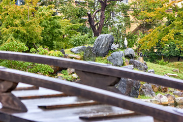 Bridge and Japanese style garden behind it