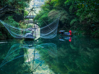 HUBEI,CHINA 5 april 2019 - red dress girl stand on the boat at Longjin stream,three gorge tribute...
