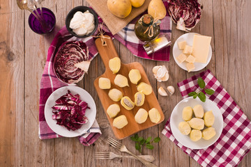 Potato gnocchi stuffed with radicchio and ricotta.