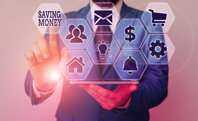 Handwriting text Saving Money. Conceptual photo putting money in an account in a bank o financial...