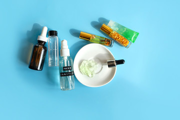 hand sanitizer. bottle of homemade disinfecting gel and ingredients (aloe vera, aroma oil,...