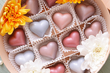 Box with delicious candies, closeup