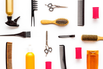 Hairdresser tools pattern on white background top-down