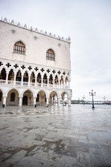 Naklejka premium Doges Palace (Palazzo Ducale) on Saint Mark square at Rainy Morning in Venice.