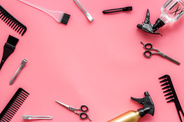 Hairdressing mockup - with brush, spray and sciccors - on pink background top-down frame copy space