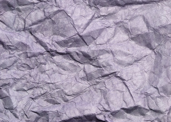 Abstract modern purple crumpled paper texture background.