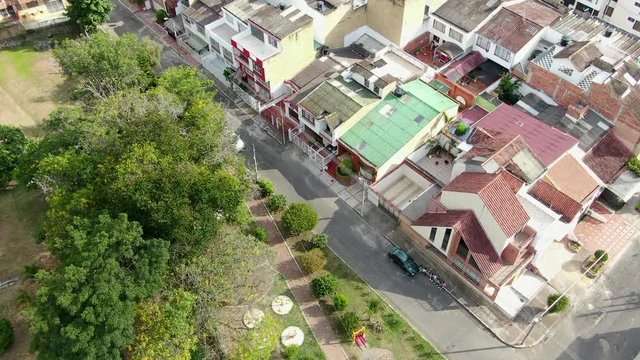 Aerial view  of a  neighbourhood suburban houses and park of Fusagasuga (Fusa)
