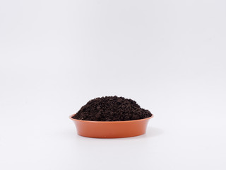 Fototapeta na wymiar black earth compost peat for planting seedlings