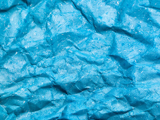 Texture of blue crumpled paper background for design