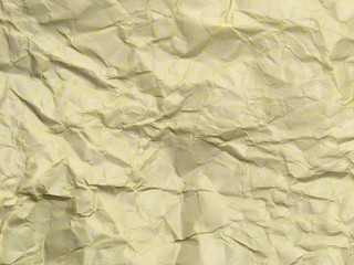 Yellow crumpled paper background with pattern for design