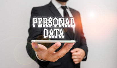 Handwriting text writing Personal Data. Conceptual photo Information that relates to an identifiable individual Male human wear formal work suit hold smart hi tech smartphone use one hand