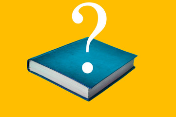 turquoise book on a yellow background