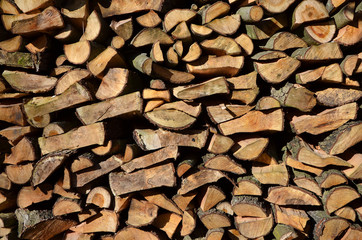 stack of firewood natural background closeup