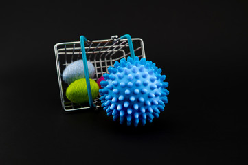 Virus molecule on a shopping basket and Easter eggs
