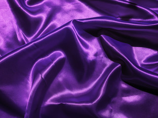 Abstract purple fabric texture background with copy space for design