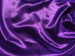 Abstract purple fabric texture background with copy space for design