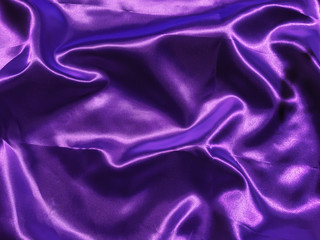 Abstract purple fabric texture background with copy space for design