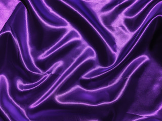 Abstract purple fabric texture background with copy space for design