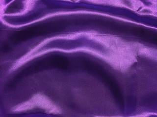 Abstract purple fabric texture background with copy space for design
