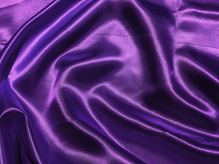 Abstract purple fabric texture background with copy space for design
