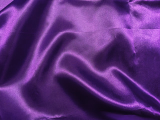 Abstract purple fabric texture background with copy space for design