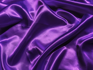 Pattern of purple fabric texture background.  wavy folds of grunge silk texture satin velvet material for design